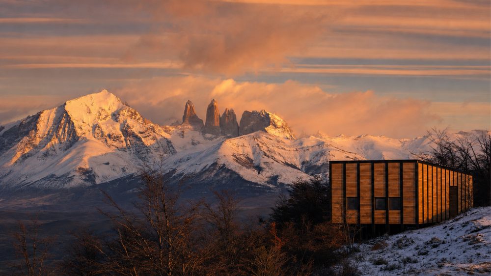 Sunset over Awasi Patagonia luxury lodge surrounded by Patagonia’s dramatic landscape