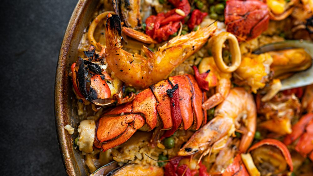 Galician seafood paella served at a luxury dining experience in Spain