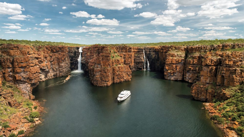 True North luxury expedition cruise sailing through the Kimberley with dramatic gorges in Australia